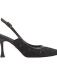 Black high-heeled shoe with a slingback design on a white background