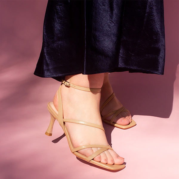 Showing off Mi/Mai Venice strappy sandal with ankle strap in beige leather
