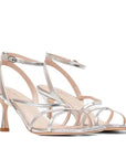 angled view of Mi/Mai Venice strappy sandal with ankle strap in metallic silver leather