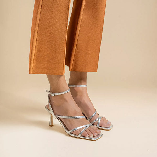 Mi/Mai Venice strappy sandal with ankle strap in metallic silver leather styled with smart trousers