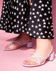 Mi/Mai Nelly strappy slingback sandal in soft lilac styled with bold black and white dress for spring