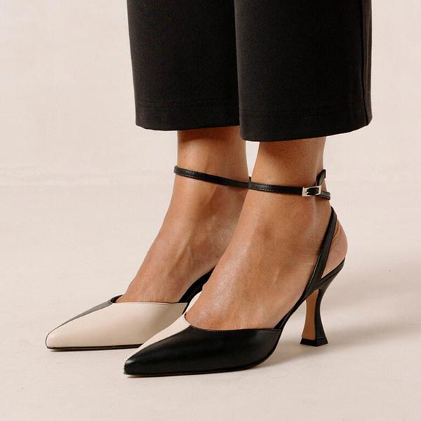 ALOHAS Cinderella black and white leather pumps on model