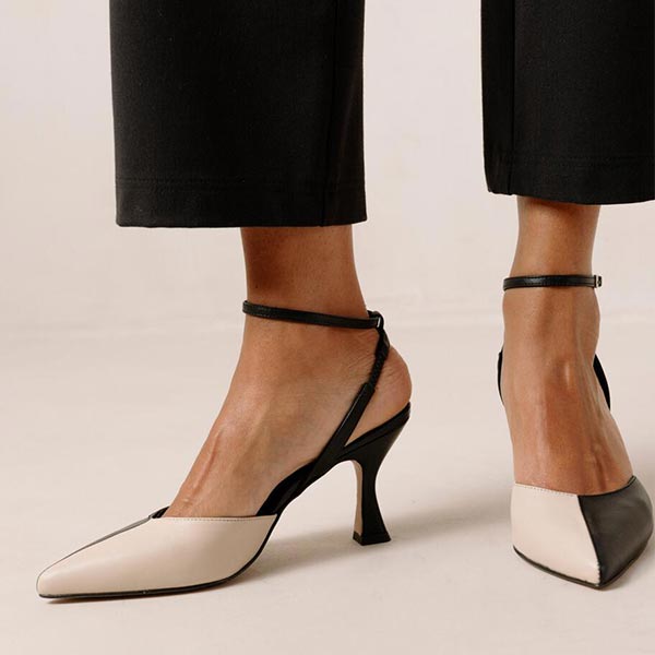 ALOHAS Cinderella black and white leather pumps on model