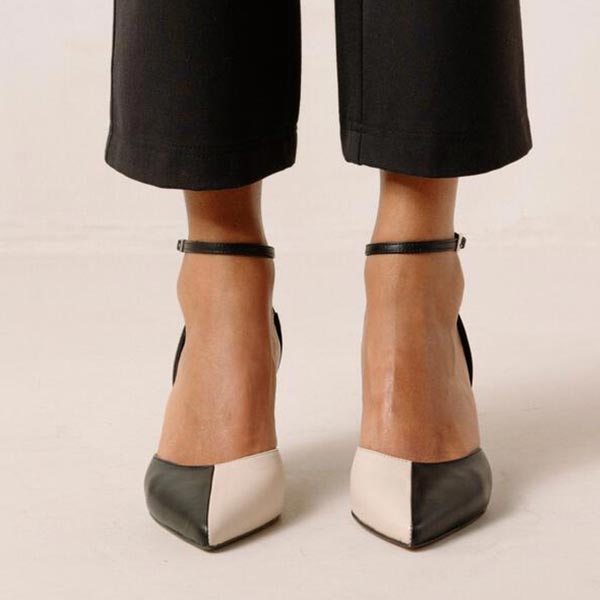 ALOHAS Cinderella black and white leather pumps on model