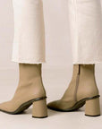 ALOHAS west cape cactus warm beige ankle boot on model wearing white cropped jeans