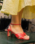 Mi/Mai Mon red leather mid heel sandal on model 