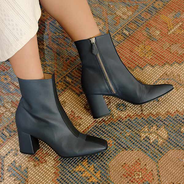 Sylven New York Jayne navy/black apple leather boot on model 2
