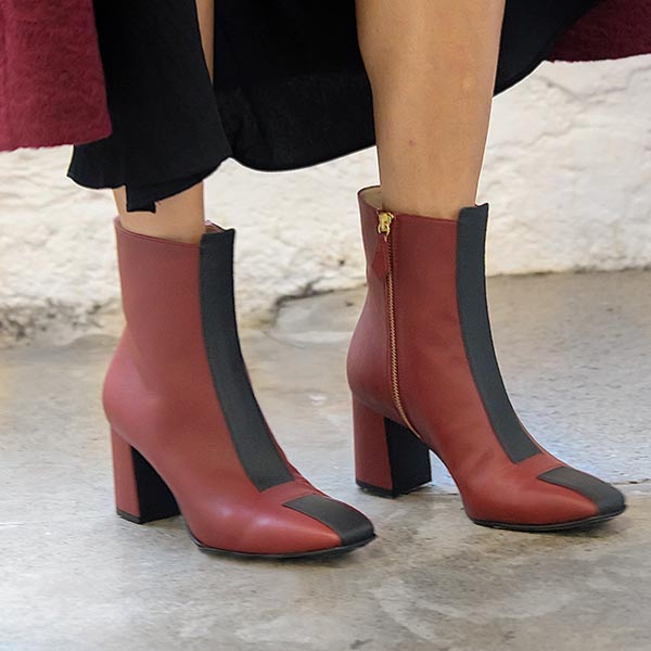 Sylven new York Jayne red/black apple leather boot on model 1