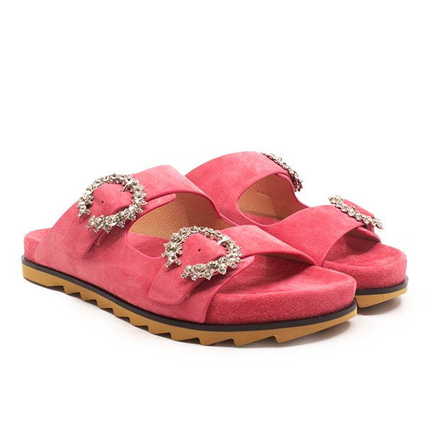 Coral pink suede JUAL slides showing the moulded footbed and crystal buckles.