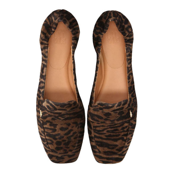 pair of leopard print suede loafers shot from above on a white background