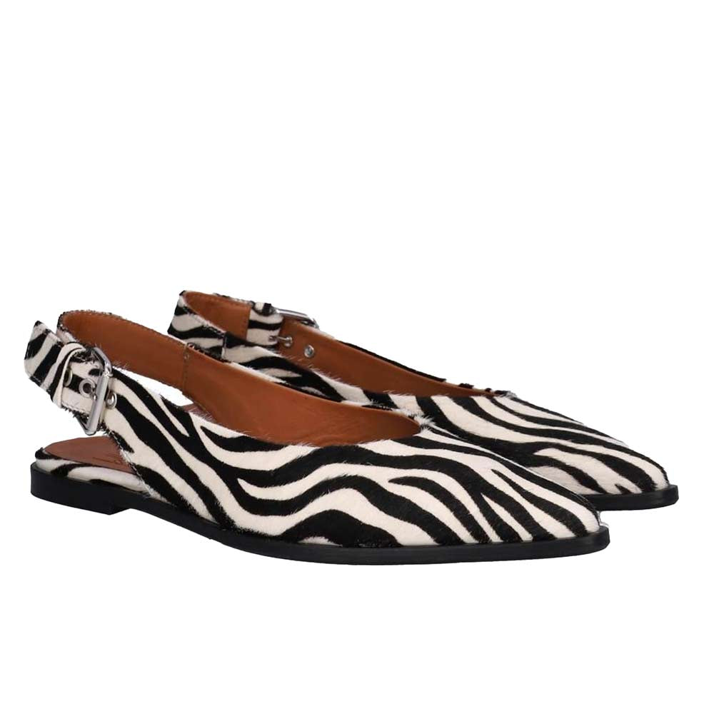 Pair of zebra print slingback flats on a white background
