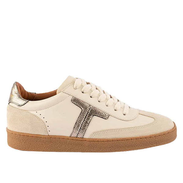 Cream suede and leather sneaker with metallic accents and a gum sole on a white background