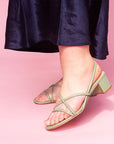 Mi/Mai Nelly strappy slingback sandal with mid block heel in sage green modelled with a navy satin dress