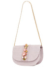 NALÌ CARLA clutch in lilac with 3D flower embellishments and gold shoulder chain on white background