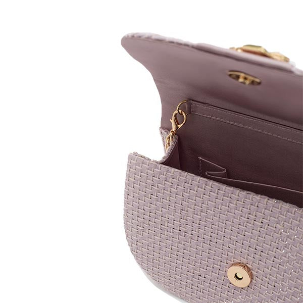 Inside NALÌ CARLA clutch in lilac shot on white background