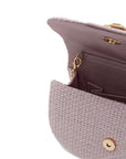 Inside NALÌ CARLA clutch in lilac shot on white background