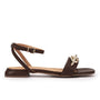 Side view of Pedro miralles Villena sandals in chocolate brown with gold chain detail.