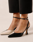 ALOHAS Cinderella black and white leather pumps on model