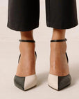 ALOHAS Cinderella black and white leather pumps on model 