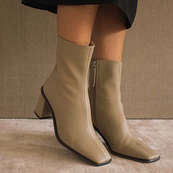 ALOHAS west cape cactus warm beige ankle boot on model wearing black skirt