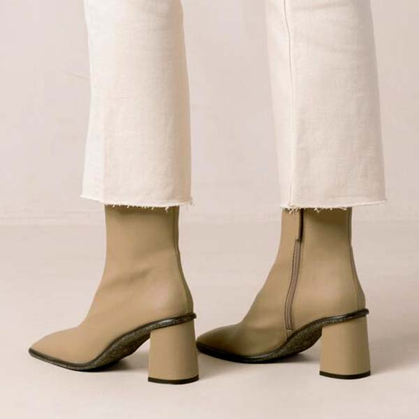 ALOHAS west cape cactus warm beige ankle boot on model wearing white cropped jeans