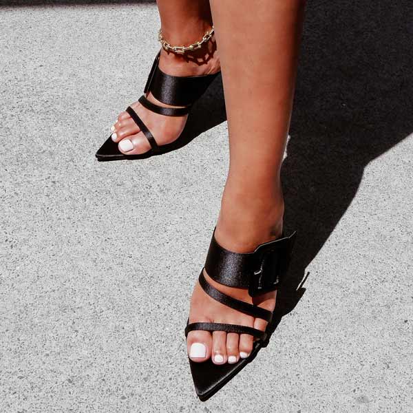 Kat Maconie Penitas black satin mule on model close up 1