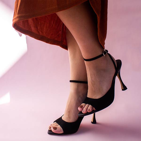 Lola cruz kaira black suede high heel sandal on model