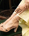 Mi/Mai Mon beige leather mid heel sandal on model 