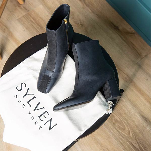 Sylven New York Jayne navy/black apple leather boot flatlay